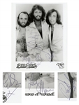 Bee Gees 8 x 10 Photo Signed by All Three Brothers Gibb