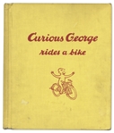 Curious George First Edition, Signed by H.A. Rey With His Original Ink Drawing of Curious George -- ''Curious George Rides a Bike'' From 1952