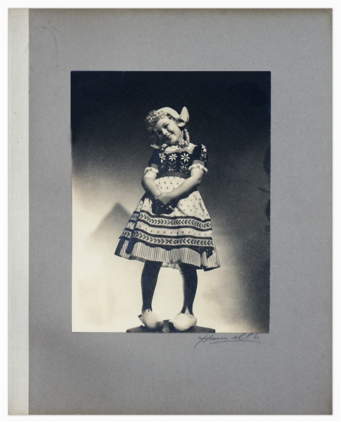Shirley Temple Personally Owned Photo From Heidi -- Large Portrait of Shirley as the Little Dutch Girl Signed by Photographer George Hurrell on Mat