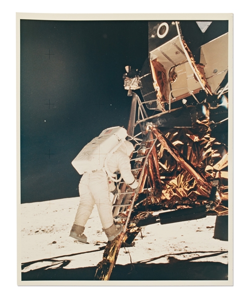 AS11-40-5868 -- Apollo 11 Photo of Buzz Aldrin Descending the Ladder Onto the Lunar Surface -- Printed on A Kodak Paper