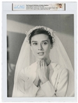 Audrey Hepburns Personally Owned Photo From The Nuns Story in a Wedding Veil -- Taken by Photographer Pierluigi Praturlon, Measuring 9.5 x 11.75 -- Encapsulated by CAG