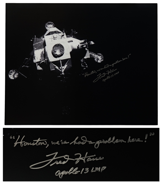 Fred Haise Signed 20'' x 16'' Photo of the Apollo 13 Lunar Module ''Lifeboat'' That Kept the Crew Alive for Days -- Haise Also Writes the Famous Quote, ''Houston, we've had a problem here!''