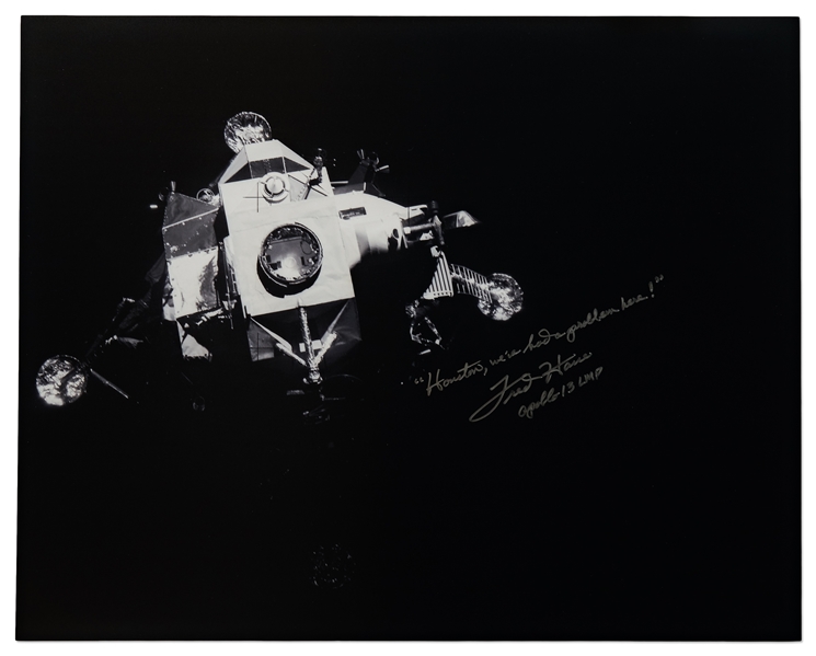 Fred Haise Signed 20'' x 16'' Photo of the Apollo 13 Lunar Module ''Lifeboat'' That Kept the Crew Alive for Days -- Haise Also Writes the Famous Quote, ''Houston, we've had a problem here!''