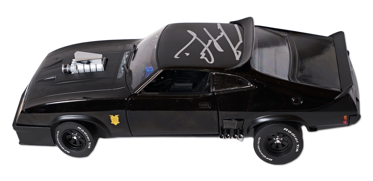 Mel Gibson Signed ''Mad Max'' 1973 Ford Falcon XB Interceptor Model Car
<br>