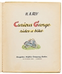 H.A. Rey Signed First Edition of ''Curious George Rides a Bike'' with Rey Also Drawing an Illustration of the Curious Monkey