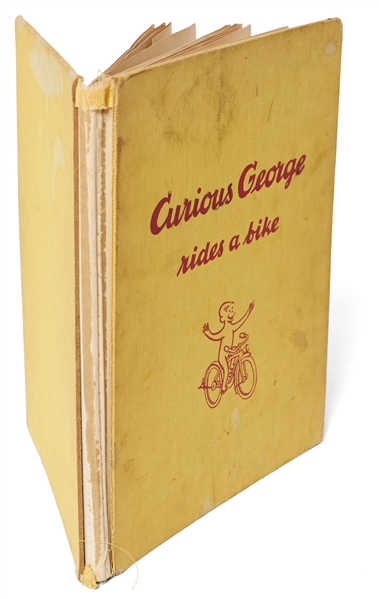 H.A. Rey Signed First Edition of ''Curious George Rides a Bike'' with Rey Also Drawing an Illustration of the Curious Monkey