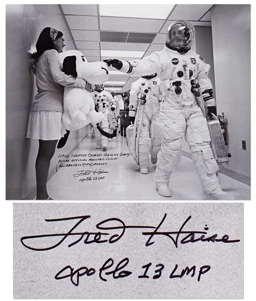 Fred Haise Signed 20 x 16 Photo of Apollo 10 Commander Tom Stafford Tapping Snoopys Nose Before the Mission -- Haise Writes: NASA adopted Charles Schulzs Snoopy as the official...mascot