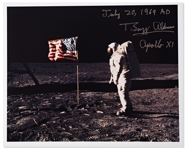 Buzz Aldrin Signed 10 x 8 Photo with Aldrin Writing July 20, 1969 AD as He Stands Next to the U.S. Flag on the Moon