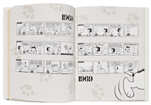 Charles Schulz Signed Snoopy Sketch, Drawn Within a First Edition of the Large Coffee Table Book ''40 Years Life and Art''