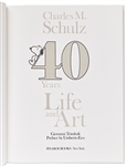 Charles Schulz Signed Snoopy Sketch, Drawn Within a First Edition of the Large Coffee Table Book ''40 Years Life and Art''