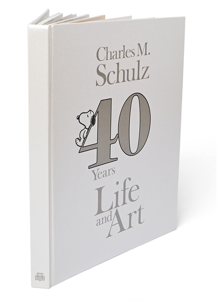 Charles Schulz Signed Snoopy Sketch, Drawn Within a First Edition of the Large Coffee Table Book ''40 Years Life and Art''