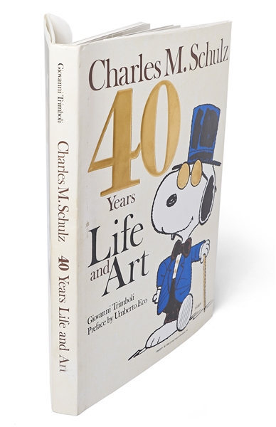 Charles Schulz Signed Snoopy Sketch, Drawn Within a First Edition of the Large Coffee Table Book ''40 Years Life and Art''