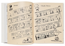 Charles Schulz Signed Snoopy Sketch, Drawn Within a First Edition of the Large Coffee Table Book ''40 Years Life and Art''